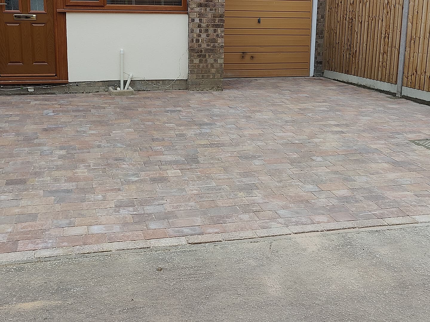 Block-Paved Driveway with Close-Board Fencing