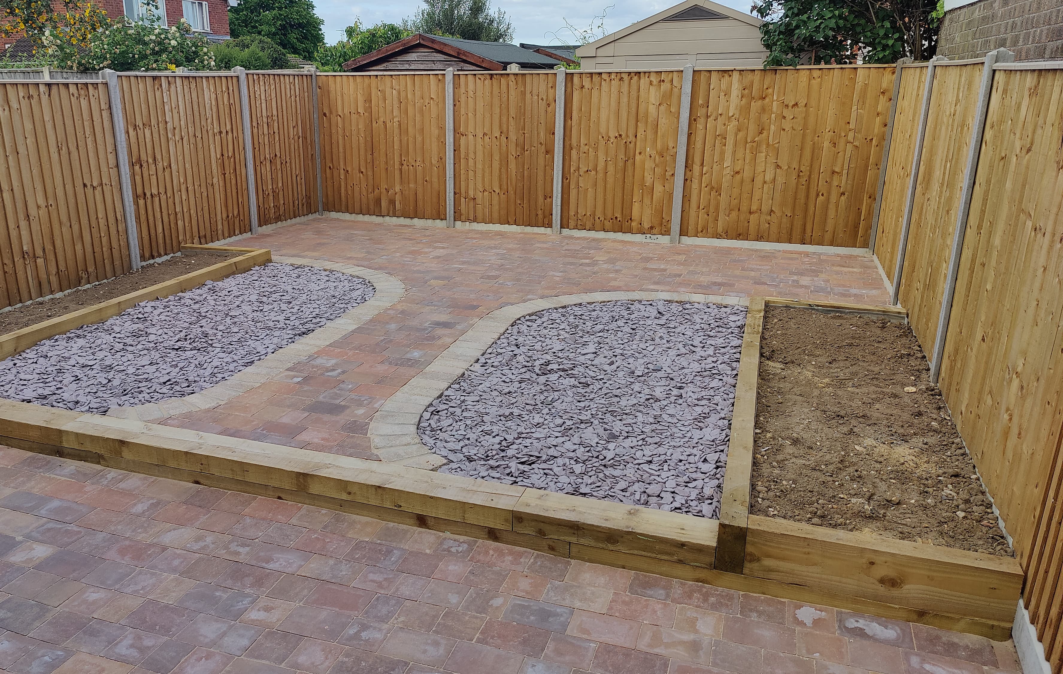 Paved Patio with Curved Gravel Beds — GMALE Services