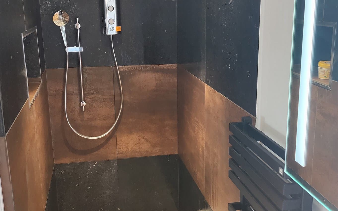 Slate and Copper-Effect Shower Room