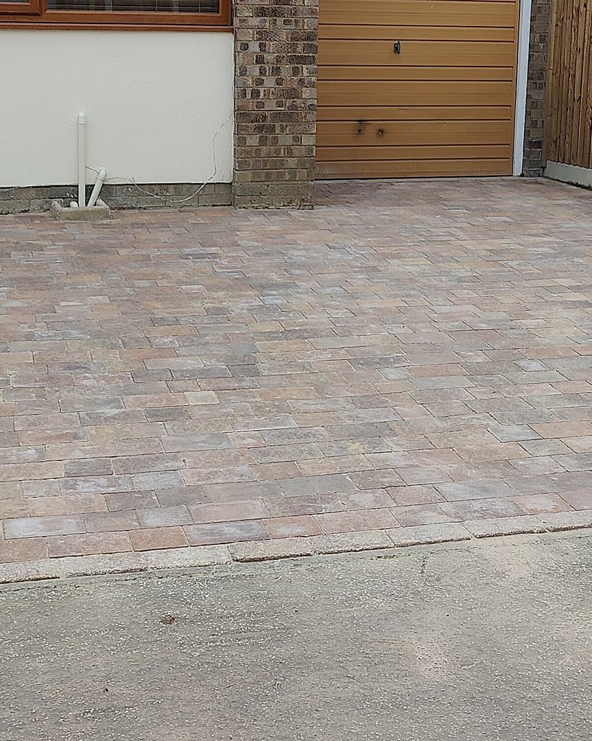 Block-Paved Driveway with Close-Board Fencing